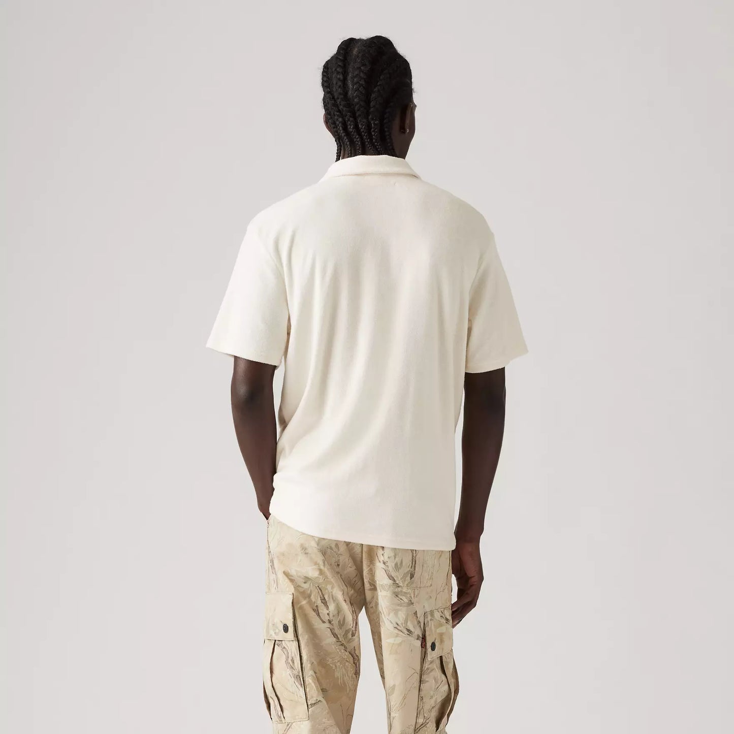 Polo Terry con taschino panna