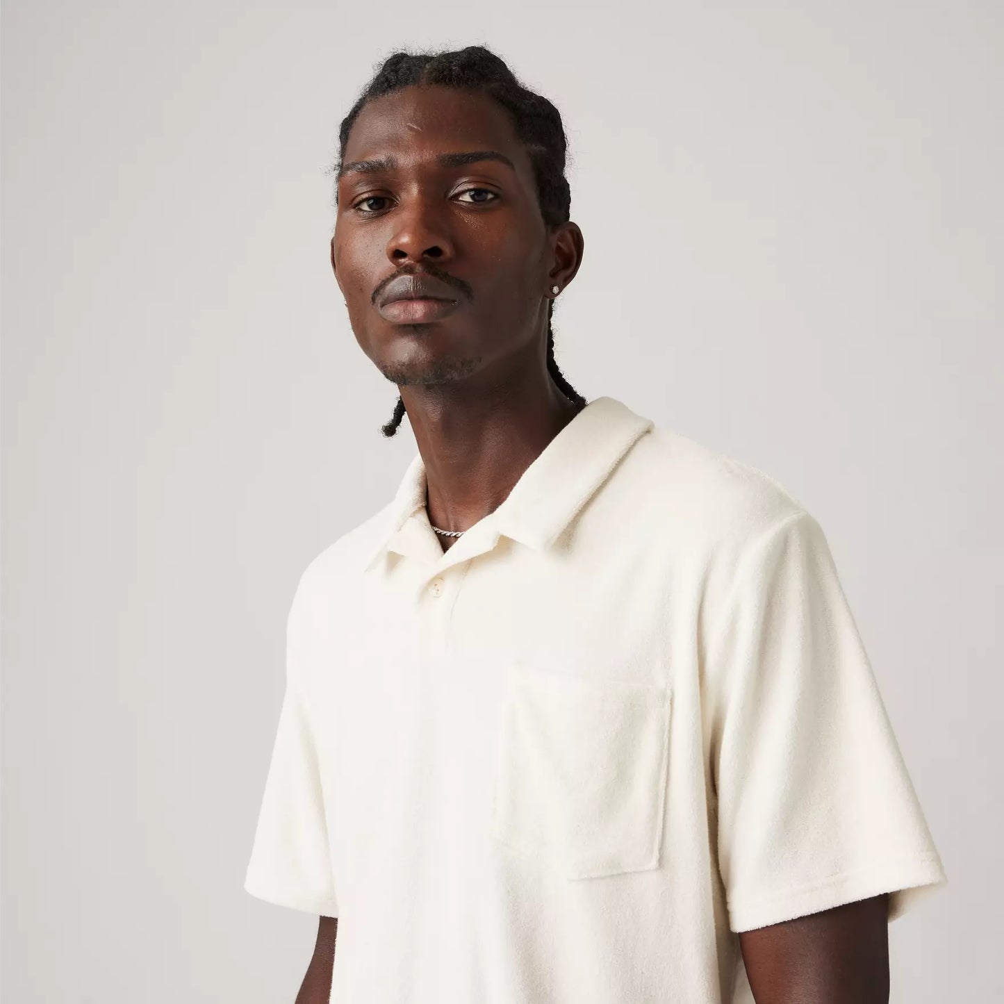 Polo Terry con taschino panna