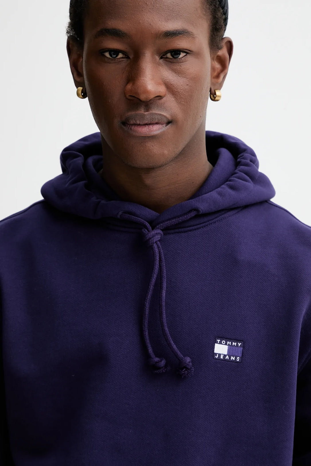 Felpa Tommy Jeans con cappuccio viola