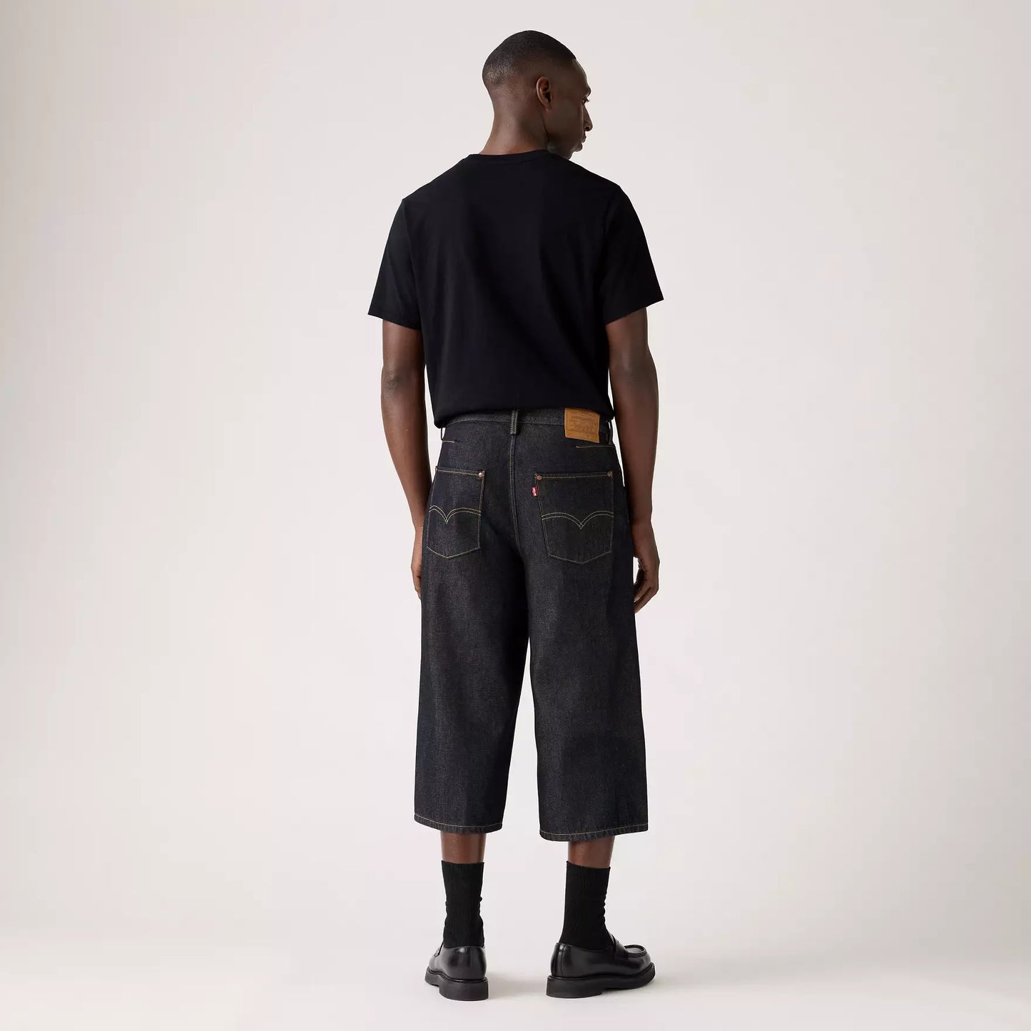 Pantaloncini Twisted baggy capri in denim blu scuro