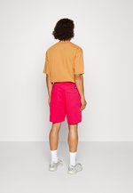 Pantaloncini Levi's Chino da skate fucsia